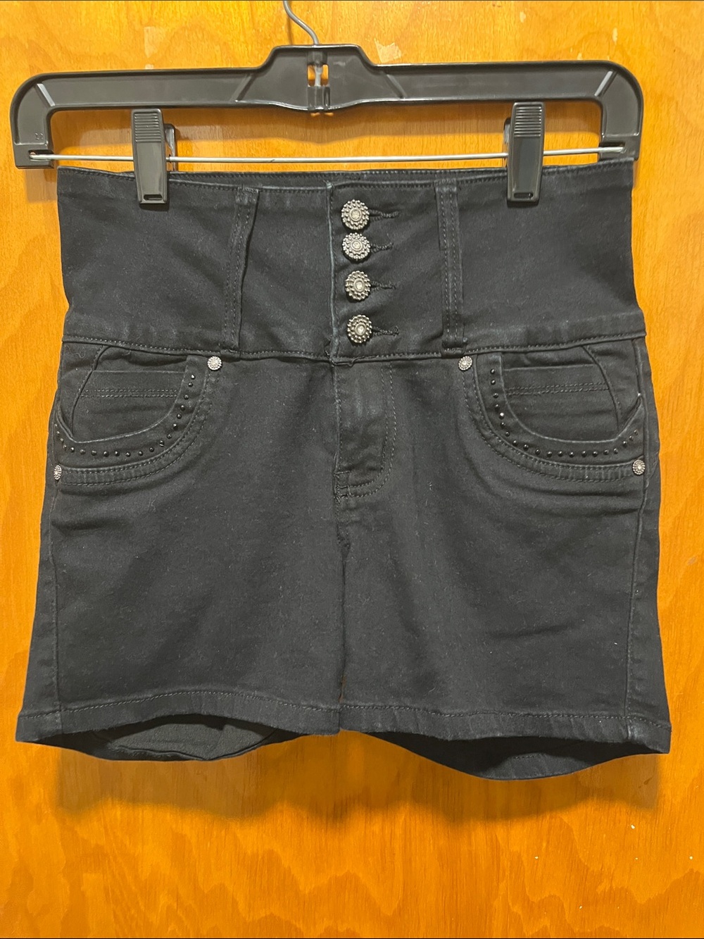 High-Waist Black Jean Shorts with Decorative Button Front